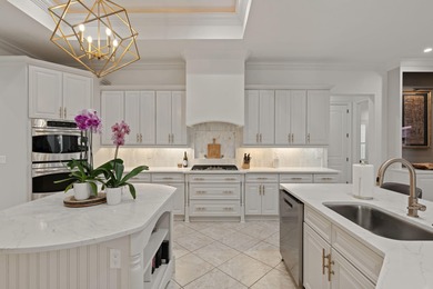 An entertainer's dream set along the 16th fairway of the Raven on Sandestin Golf and Beach Resort - Raven in Florida - for sale on GolfHomes.com, golf home, golf lot