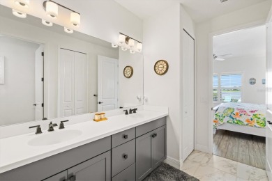 Lakeside luxury on the largest lake in Canoe Creek defines this on Palmetto Pines Golf Course in Florida - for sale on GolfHomes.com, golf home, golf lot