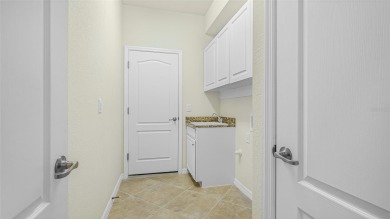 THE LOWEST PRICED 3 CAR GARAGE SINGLE-FAMILY HOME IN WELLEN PARK on Plantation Golf and Country Club in Florida - for sale on GolfHomes.com, golf home, golf lot
