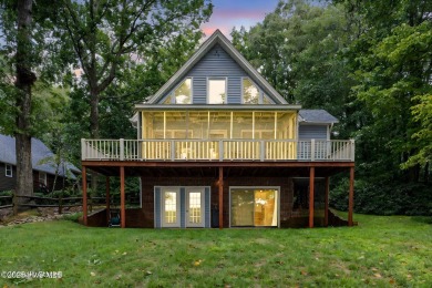 Welcome to your dream lakefront home. This 4000+ sq foot home on River Golf and Country Club at Lake Royale in North Carolina - for sale on GolfHomes.com, golf home, golf lot
