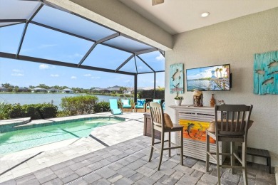 Lakeside luxury on the largest lake in Canoe Creek defines this on Palmetto Pines Golf Course in Florida - for sale on GolfHomes.com, golf home, golf lot