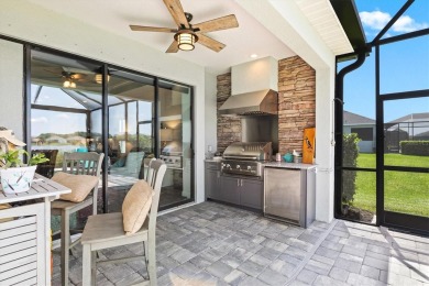 Lakeside luxury on the largest lake in Canoe Creek defines this on Palmetto Pines Golf Course in Florida - for sale on GolfHomes.com, golf home, golf lot