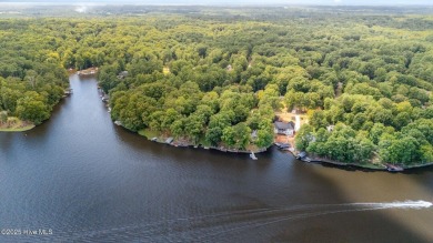 Welcome to your dream lakefront home. This 4000+ sq foot home on River Golf and Country Club at Lake Royale in North Carolina - for sale on GolfHomes.com, golf home, golf lot