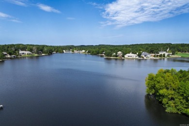 Welcome to your lakeside retreat on the desirable east side and on Granada Golf Course in Arkansas - for sale on GolfHomes.com, golf home, golf lot