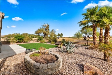 Nestled amidst the lush golf course greens and mountain vistas on Mojave Resort Golf Club in Nevada - for sale on GolfHomes.com, golf home, golf lot