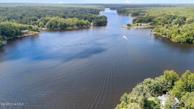 Welcome to your dream lakefront home. This 4000+ sq foot home on River Golf and Country Club at Lake Royale in North Carolina - for sale on GolfHomes.com, golf home, golf lot