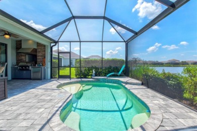 Lakeside luxury on the largest lake in Canoe Creek defines this on Palmetto Pines Golf Course in Florida - for sale on GolfHomes.com, golf home, golf lot