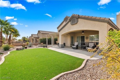 Nestled amidst the lush golf course greens and mountain vistas on Mojave Resort Golf Club in Nevada - for sale on GolfHomes.com, golf home, golf lot