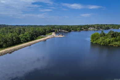 Welcome to your lakeside retreat on the desirable east side and on Granada Golf Course in Arkansas - for sale on GolfHomes.com, golf home, golf lot