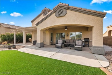 Nestled amidst the lush golf course greens and mountain vistas on Mojave Resort Golf Club in Nevada - for sale on GolfHomes.com, golf home, golf lot