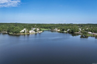 Welcome to your lakeside retreat on the desirable east side and on Granada Golf Course in Arkansas - for sale on GolfHomes.com, golf home, golf lot