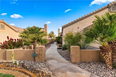 Nestled amidst the lush golf course greens and mountain vistas on Mojave Resort Golf Club in Nevada - for sale on GolfHomes.com, golf home, golf lot