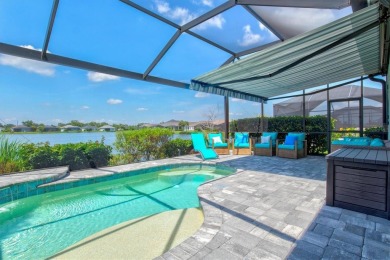 Lakeside luxury on the largest lake in Canoe Creek defines this on Palmetto Pines Golf Course in Florida - for sale on GolfHomes.com, golf home, golf lot