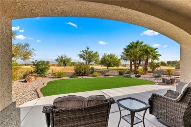 Nestled amidst the lush golf course greens and mountain vistas on Mojave Resort Golf Club in Nevada - for sale on GolfHomes.com, golf home, golf lot