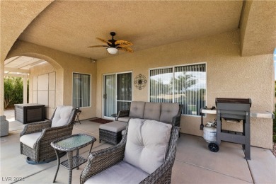 Nestled amidst the lush golf course greens and mountain vistas on Mojave Resort Golf Club in Nevada - for sale on GolfHomes.com, golf home, golf lot