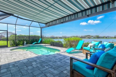 Lakeside luxury on the largest lake in Canoe Creek defines this on Palmetto Pines Golf Course in Florida - for sale on GolfHomes.com, golf home, golf lot