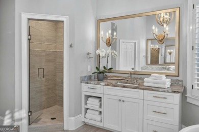 Welcome to your dream home on a quiet cul-de-sac, backing up to on The Golf Club of Georgia in Georgia - for sale on GolfHomes.com, golf home, golf lot