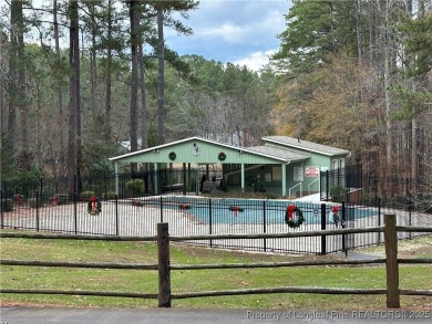 Beautiful gently sloped interior lot located in Carolina Tracee on Carolina Trace Country Club in North Carolina - for sale on GolfHomes.com, golf home, golf lot