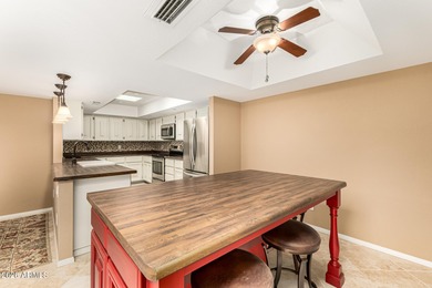 Beautifully remodeled waterfront villa in sought-after Santa Fe on McCormick Ranch Golf Club in Arizona - for sale on GolfHomes.com, golf home, golf lot