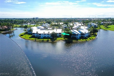 SUNLIGHT POURS IN OFF THE GLISTENING LAKE. Second floor end unit on Gulf Harbour Yacht and Country Club in Florida - for sale on GolfHomes.com, golf home, golf lot