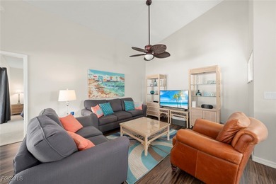 SUNLIGHT POURS IN OFF THE GLISTENING LAKE. Second floor end unit on Gulf Harbour Yacht and Country Club in Florida - for sale on GolfHomes.com, golf home, golf lot