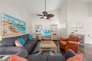 SUNLIGHT POURS IN OFF THE GLISTENING LAKE. Second floor end unit on Gulf Harbour Yacht and Country Club in Florida - for sale on GolfHomes.com, golf home, golf lot