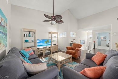 SUNLIGHT POURS IN OFF THE GLISTENING LAKE. Second floor end unit on Gulf Harbour Yacht and Country Club in Florida - for sale on GolfHomes.com, golf home, golf lot