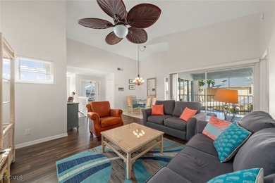 SUNLIGHT POURS IN OFF THE GLISTENING LAKE. Second floor end unit on Gulf Harbour Yacht and Country Club in Florida - for sale on GolfHomes.com, golf home, golf lot