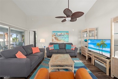 SUNLIGHT POURS IN OFF THE GLISTENING LAKE. Second floor end unit on Gulf Harbour Yacht and Country Club in Florida - for sale on GolfHomes.com, golf home, golf lot