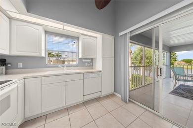 SUNLIGHT POURS IN OFF THE GLISTENING LAKE. Second floor end unit on Gulf Harbour Yacht and Country Club in Florida - for sale on GolfHomes.com, golf home, golf lot