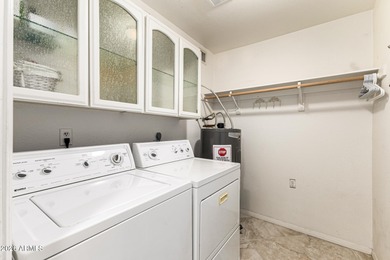 Beautifully remodeled waterfront villa in sought-after Santa Fe on McCormick Ranch Golf Club in Arizona - for sale on GolfHomes.com, golf home, golf lot