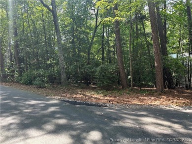 Beautiful gently sloped interior lot located in Carolina Trace on Carolina Trace Country Club in North Carolina - for sale on GolfHomes.com, golf home, golf lot