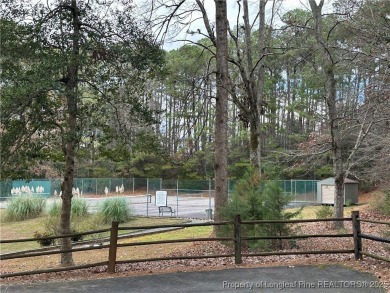 Beautiful gently sloped interior lot located in Carolina Trace on Carolina Trace Country Club in North Carolina - for sale on GolfHomes.com, golf home, golf lot