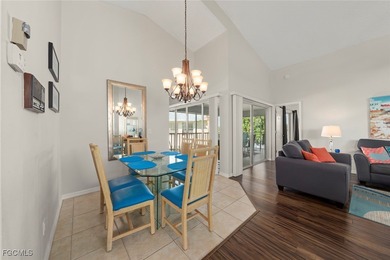 SUNLIGHT POURS IN OFF THE GLISTENING LAKE. Second floor end unit on Gulf Harbour Yacht and Country Club in Florida - for sale on GolfHomes.com, golf home, golf lot