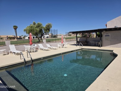 Beautiful Golf Course Condo with Lake Views! Discover golf on London Bridge Golf Course in Arizona - for sale on GolfHomes.com, golf home, golf lot
