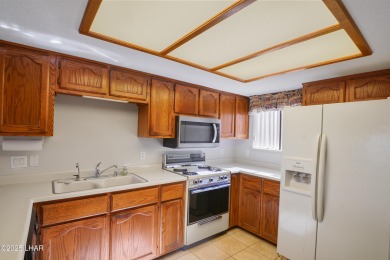 Beautiful Golf Course Condo with Lake Views! Discover golf on London Bridge Golf Course in Arizona - for sale on GolfHomes.com, golf home, golf lot