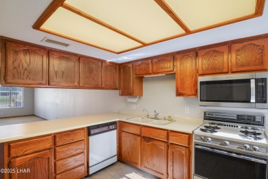 Beautiful Golf Course Condo with Lake Views! Discover golf on London Bridge Golf Course in Arizona - for sale on GolfHomes.com, golf home, golf lot