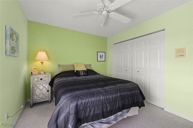 SUNLIGHT POURS IN OFF THE GLISTENING LAKE. Second floor end unit on Gulf Harbour Yacht and Country Club in Florida - for sale on GolfHomes.com, golf home, golf lot