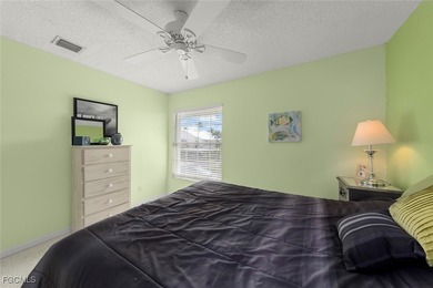 SUNLIGHT POURS IN OFF THE GLISTENING LAKE. Second floor end unit on Gulf Harbour Yacht and Country Club in Florida - for sale on GolfHomes.com, golf home, golf lot