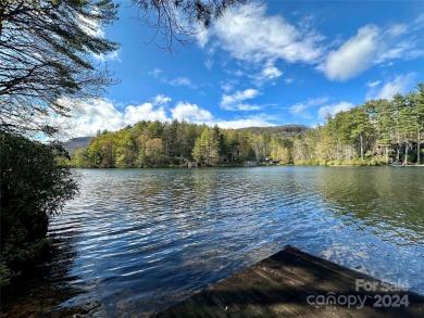 Absolutely magnificent and rare gentle lakefront lot with on Lake Toxaway Country Club in North Carolina - for sale on GolfHomes.com, golf home, golf lot