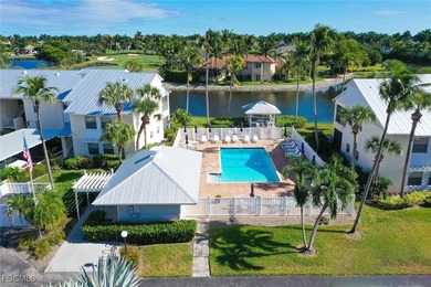 SUNLIGHT POURS IN OFF THE GLISTENING LAKE. Second floor end unit on Gulf Harbour Yacht and Country Club in Florida - for sale on GolfHomes.com, golf home, golf lot