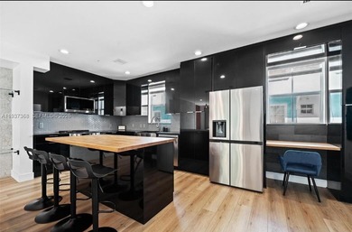 Welcome to this stunning, fully furnished modern residence on Eco Golf Club in Florida - for sale on GolfHomes.com, golf home, golf lot