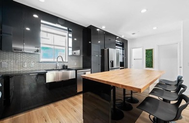 Welcome to this stunning, fully furnished modern residence on Eco Golf Club in Florida - for sale on GolfHomes.com, golf home, golf lot