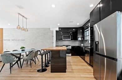 Welcome to this stunning, fully furnished modern residence on Eco Golf Club in Florida - for sale on GolfHomes.com, golf home, golf lot