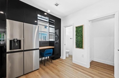 Welcome to this stunning, fully furnished modern residence on Eco Golf Club in Florida - for sale on GolfHomes.com, golf home, golf lot