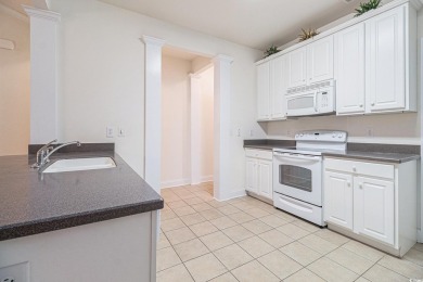 Top-Floor Retreat with Elevator, Vaulted Ceilings, Fireplace on International Club of Myrtle Beach in South Carolina - for sale on GolfHomes.com, golf home, golf lot