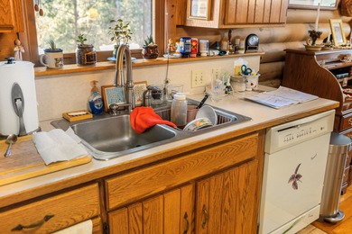 Charming 3-bedroom, 2-bath log home located in the heart of on Woodstone Meadows Golf Course At Massanutten in Virginia - for sale on GolfHomes.com, golf home, golf lot