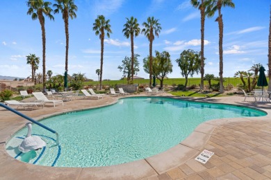 This condo features a premium location with lake, fairway and on Palm Royale Country Club in California - for sale on GolfHomes.com, golf home, golf lot