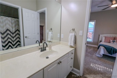 Welcome to this charming ranch home in the highly sought-after on Gates Four Golf and Country Club in North Carolina - for sale on GolfHomes.com, golf home, golf lot