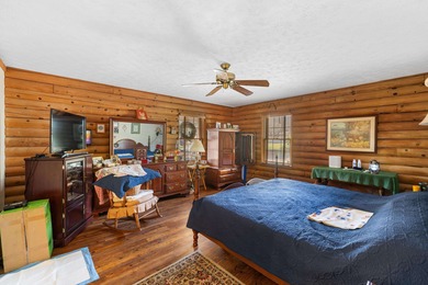 Charming 3-bedroom, 2-bath log home located in the heart of on Woodstone Meadows Golf Course At Massanutten in Virginia - for sale on GolfHomes.com, golf home, golf lot